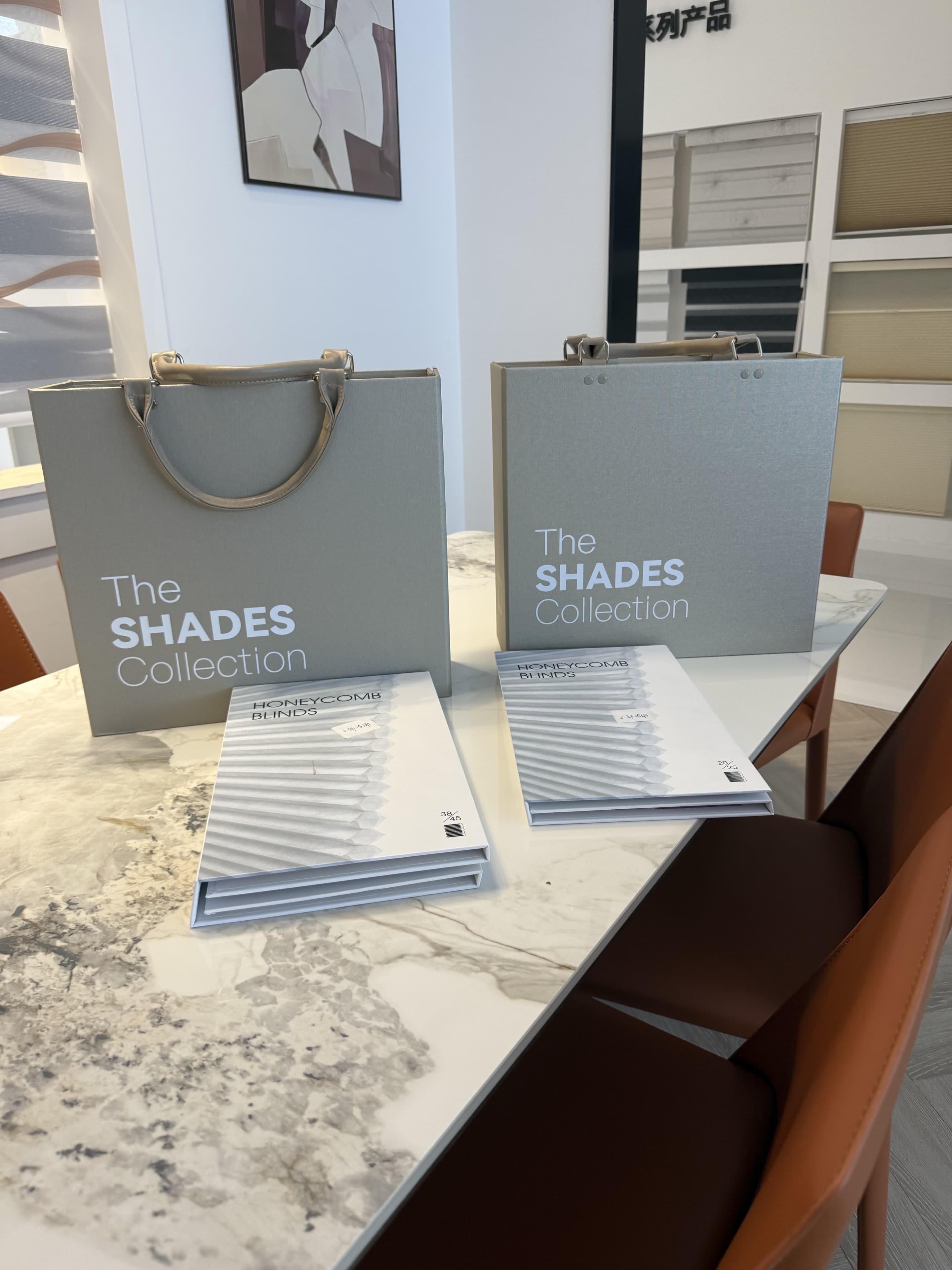 Four physical fabric sample books